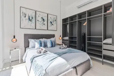 a bedroom with a bed with teddy bears on it at Luxury Miami Oasis with Heated Pool and BBQ Grill in Miami
