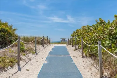 a path through the sand on the beach at Ocean Front Studio - Miami Beach in Miami Beach