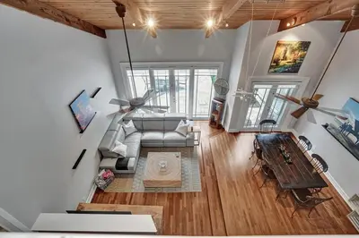 a living room with a couch and a table at Fun Location! 1 block to Las Olas Pool & Parking in Fort Lauderdale