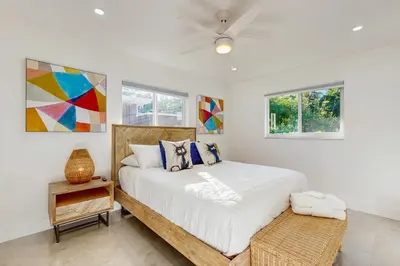 a bedroom with a bed and a ceiling fan at JS & JS 2040 LLC in Fort Lauderdale