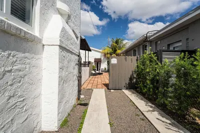 a side view of a house with a driveway at Suite Mar - Unit B in Miami