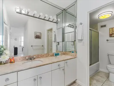 a bathroom with a sink and a toilet at Sea Air Towers - Oceanfront Condo w Pool & Gym in Hollywood