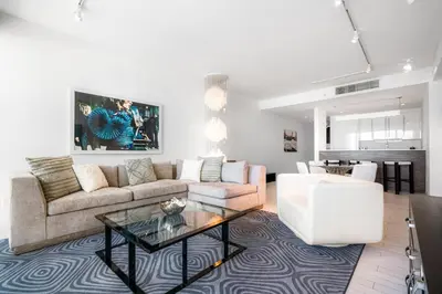 a living room with a couch and a table at OceanView 1B Private Residence at South Beach - 1114 in Miami Beach