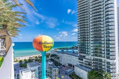 a view of the beach and the hollywood beach sign at Ocean Luxe Pad for 6 Guests with Poolside Access in Hollywood
