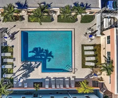 an overhead view of a swimming pool in a building at Exclusive studio steps to the beach with pool in Hollywood