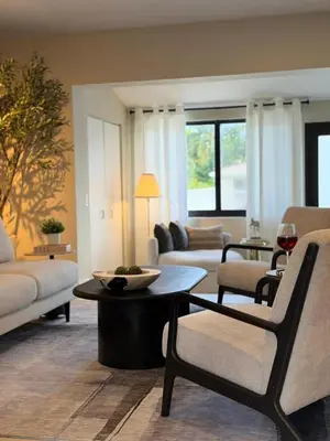 a living room with a couch and a table at Buena Vista Oasis - 3BR Home Near Art District Family in Miami
