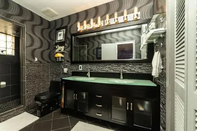 a bathroom with a sink and a mirror at Riverfront- Home in Hollywood