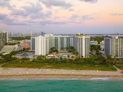 an aerial view of a beach and buildings at Villa Lumea in Miami Beach