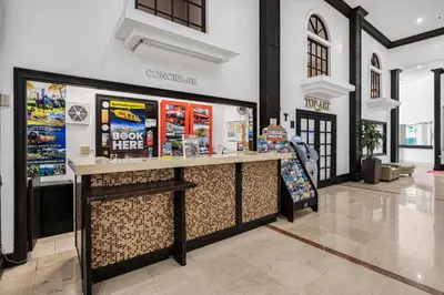 a store with a counter in a building at Beachfront Studio with Resort Access STR-02630 in Sunny Isles Beach