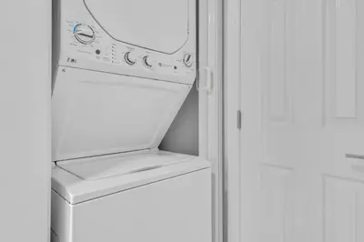 a white washer and dryer in a kitchen at Modern 2-Bedroom Apartment in Miami