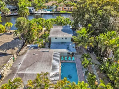 an aerial view of a house with a swimming pool at The Jute Box - Pool - Waterview - Wilton Drive in Fort Lauderdale