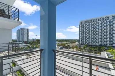 a balcony with a view of a building at Modern Studio in Downtown Doral in Miami