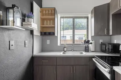 a kitchen with a sink and a window at Unit 1 Cozy 1BR Apt with Parking in Miami