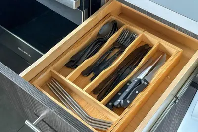 a wooden drawer with utensils in a kitchen at Unit 1 Cozy 1BR Apt with Parking in Miami