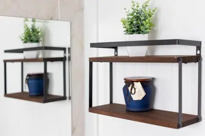 two shelves with plants and a blue vase on a wall at Unit 4 Beautiful 1BR Apt w Parking Near Biscayne Blvd in Miami