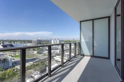 an apartment balcony with a view of the city at 72 Park Ocean view 1BR Apartment with Pool and Gym in Miami Beach