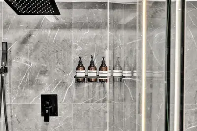 a group of bottles of alcohol sitting in a shower at Lux Villa Heated Pool, Gym, Games, Golf, Near Beach in Hollywood