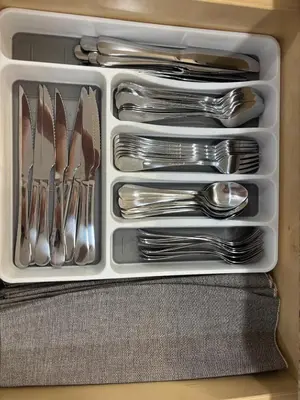 a white tray filled with forks and spoons and silverware at Close to the beach, in a quiet neighborhood in Hollywood