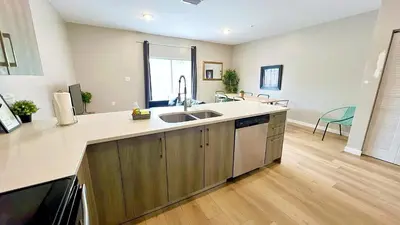 a kitchen with a sink and a counter top at Free Parking 15 Min to Hard Rock Stadium in Miami