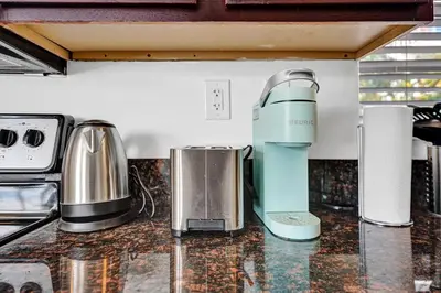a blender sitting on a counter in a kitchen at Desoto 2 bedrooms first floor in Hollywood