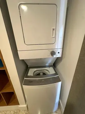 a washer and dryer in a small room at Prime Brickell Suites - One Free Parking With Self Check-in in Miami