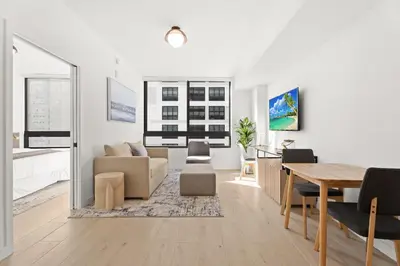 a living room with a couch and a table at Prime Downtown Location - Amazing Amenities & Top Location in Miami