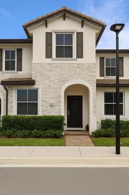 a house with a black door and a street light at NEW House, Near Beaches, and MIA, Sleeps 8! in Westview