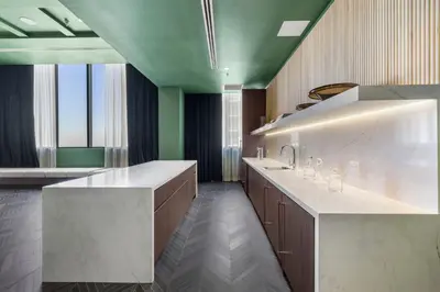 a kitchen with a white counter and a sink at Spectacular Cityviews - Steps from Bayfront Park in Miami