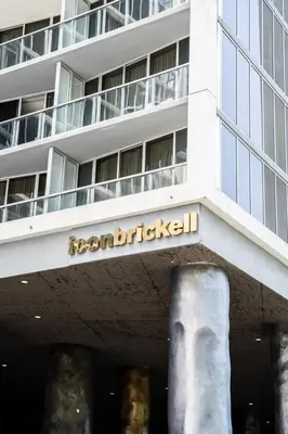 a building with a sign that reads roman diabetes at Brickell 35th Floor Residence with Saltwater Pool 5-Star Amenities in Miami