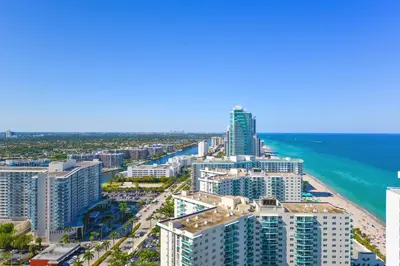 an aerial view of a city and the ocean at Luxury Condo with Beach Access in Hollywood