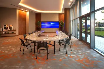 a conference room with a large table and chairs at Luxury Condo with Beach Access in Hollywood