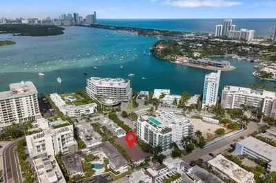 an aerial view of a city with a red marker at 2BR near Bal Harbour beautiful in Miami Beach