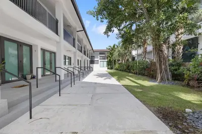 a walkway in front of a building at 2BR near Bal Harbour beautiful in Miami Beach