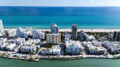 an aerial view of a city and the beach at Retro Miami RareFREE Parking 1 Min to Beach in Miami Beach