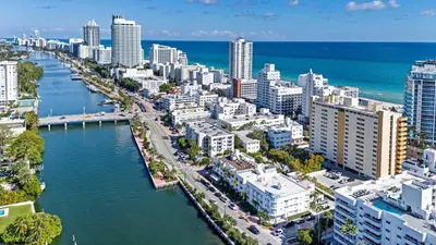 an aerial view of a city next to the ocean at Art Deco Gem by the Beach King Bed & Parking in Miami Beach