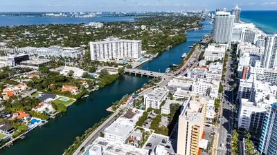 an aerial view of a city with a river and buildings at Art Deco Gem by the Beach King Bed & Parking in Miami Beach