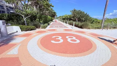 a road with a number in the middle of it at Art Deco Gem Steps to Beach in Miami Beach