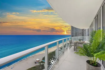 a view of the ocean from the balcony of a condo at Oceanline 3BR Corner Balcony & Calm Seas in Hollywood