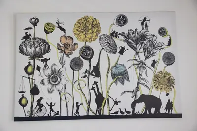 a painting of flowers on a wall at B08 10 MIN FROM MIAMI BEACH, Studio, Miami Design District & Wynwood in Miami