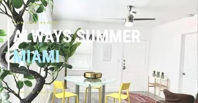 a dining room with a table and yellow chairs at B10 7 MIN FROM MIAMI BEACH, 1 Bed Apartment, Design District & Wynwood in Miami