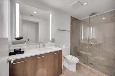 a bathroom with a sink and a toilet and a shower at Amazing property in Miami