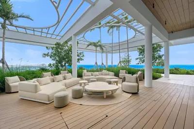 a living room with white furniture and a view of the ocean at NOK Classy 2BR in Miami Beach in Miami Beach