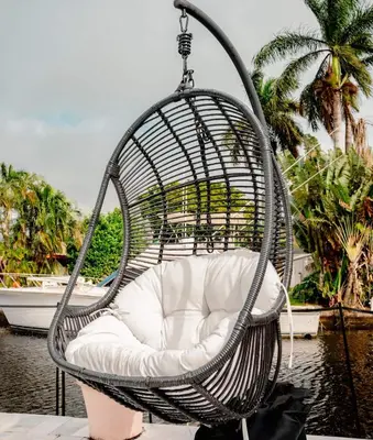 a swing chair sitting on top of a boat at Bimini Bliss Waterfront Pool Retreat in Fort Lauderdale