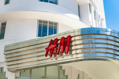 a sign on the side of a building at Bluebird Suites at The Apex Miami in Miami Beach