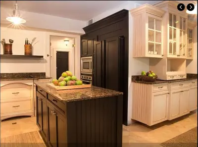 a kitchen with a bowl of fruit on a counter at Historic Sailboat Bend Home 5 Min to Las Olas 4 miles to the Beach in Fort Lauderdale