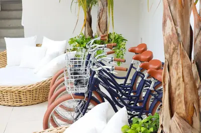 a group of bikes parked next to a couch at Cardozo Hotel in Miami Beach