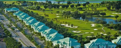 an aerial view of a resort with blue roofs at Spacious 1BR Loft Villa - Pool Golf - Doral Downtown in Miami