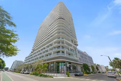 a tall white building on a city street at NOK Amazing 1 BR in Miami Beach in Miami Beach