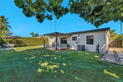 a view of a house with a yard at Azure Coastal Breeze in North Miami Beach