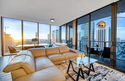 a living room with a couch and a table at Downtown Miami Excape in Miami